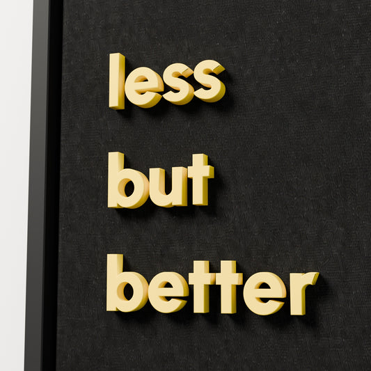 less but better — black frame, raised lettering detail