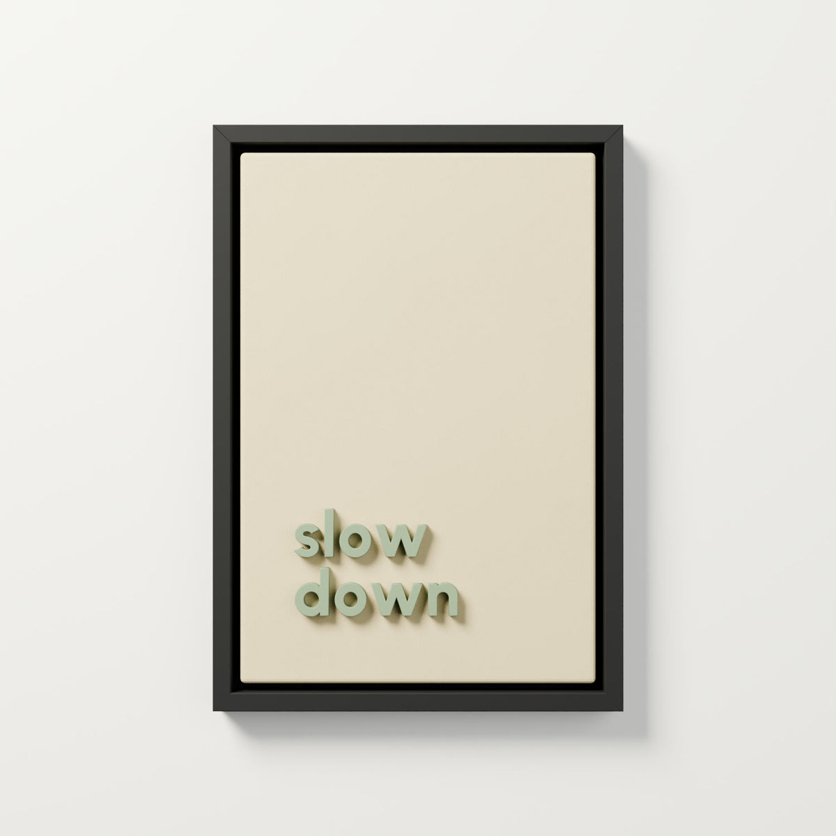 "slow down" 3 boyutlu tablo, açık krem gabardin kumaş, adaçayı yeşili harfler, siyah L çerçeve, 35x50 cm
